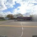 Man stumbling in roadway near party store