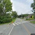 Unknown wire down across driveway on Church Street