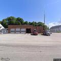 Young child with leg injury outside fire department