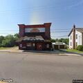 Man slumps over in front of Montello Theater