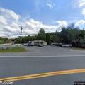 Trash fire in garbage truck near Creek House Diner