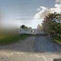 Suspicious pickup truck in driveway in Porter