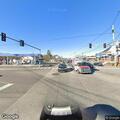 Disabled car blocking road near Walgreens