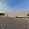 Traffic stop on black Dodge Caravan in parking lot