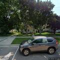 Person throwing objects at house on Main Street