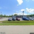 Alarm or music sounding at auto dealership