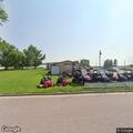 Male crying while lying on boulevard in Amboy