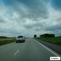 Blue box truck reported crossing center line in fog