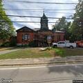 Subject evaluated at library, transported to hospital