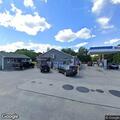 Two-car crash with fluid leak at Durham gas station
