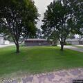 Workers lying in yard of Colman daycare home