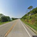 Hard-to-see bicyclist in center of Highway 26