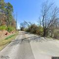 Suspicious black Nissan speeds away on Shallowford Rd