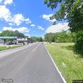 Police search area near gas station for fleeing person
