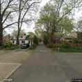 Officer checks person at larceny scene