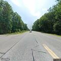 Report of gray sedan driving erratically on Route 101