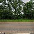 Abandoned vehicle scheduled for tow on highway