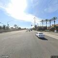 Person suffering from abdominal pain at intersection