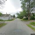 Unresponsive person with agonal breathing on Spring Street