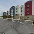 Woman having seizure outside Candlewood Suites grilling area