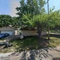 Backyard leaf burning complaint on East 5th Street