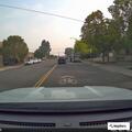 Traffic stop involving gray Subaru at intersection
