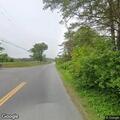 Car hits utility pole at Old County Road intersection