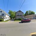 Light fixture fire in multi-family building room