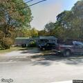 Car and dump truck crash with driver trapped