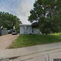 Smoke and flames reported behind house in Black Hawk