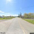 Truck repeatedly runs stop sign, debris flying