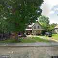 Unconscious person breathing near Maple Street