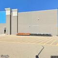 Officer checks occupied vehicle at Neenah Walmart