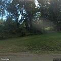 Tree and power lines down with smoke in roadway