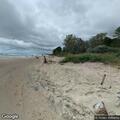 Small bonfire on beach at Magoon Creek
