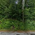 Subject cutting vegetation on driveway refuses to leave