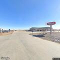 Traffic stop on green GMC Yukon near Arnold Machinery