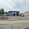 Suspicious sedan reported at gas station lot