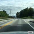 Erratic dark red sedan reported on Route 201