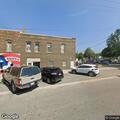 Traffic stop on blue Nissan Rogue near Pine Street