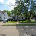 Man yelling at front door at North Division home