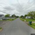 Person experiencing back pain on Reed Point Road