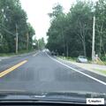 Officer checks motorcycle for license plate