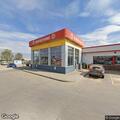 Officer traffic stop on gold Pontiac near North Shell
