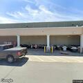 Truck leaking fluid in store parking lot