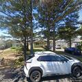 Person suffering back pain near Driftwood Lane