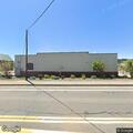 Suspicious car with sleeper near store parking lot