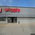 Male slumped over wheel in parked vehicle