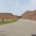 Officer checks open door at elementary school