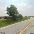 Car leaves roadway and enters cornfield
